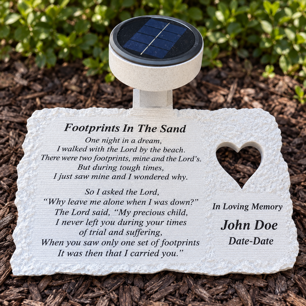 Heart design personalized solar memorial with Footprints In The Sand poem in a garden, showing John Doe and Date-Date examples