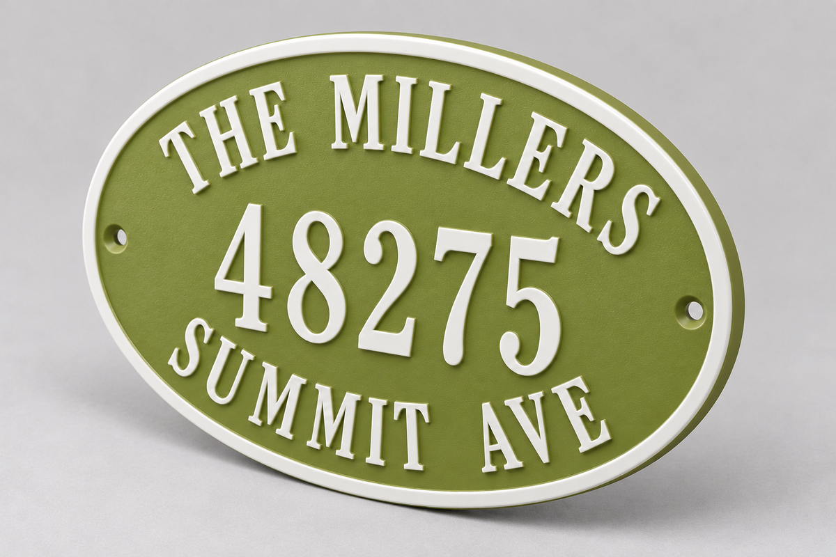 Personalized oval family name and address sign in natural green and white — angled detail view