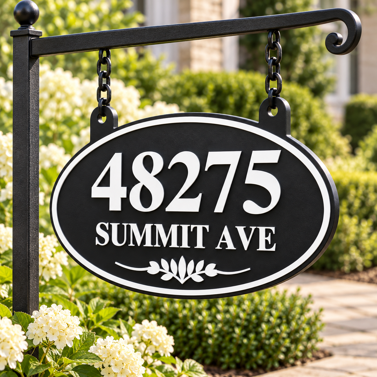 Black & White oval hanging address sign with 48275 Summit Ave, angled view showing raised detail