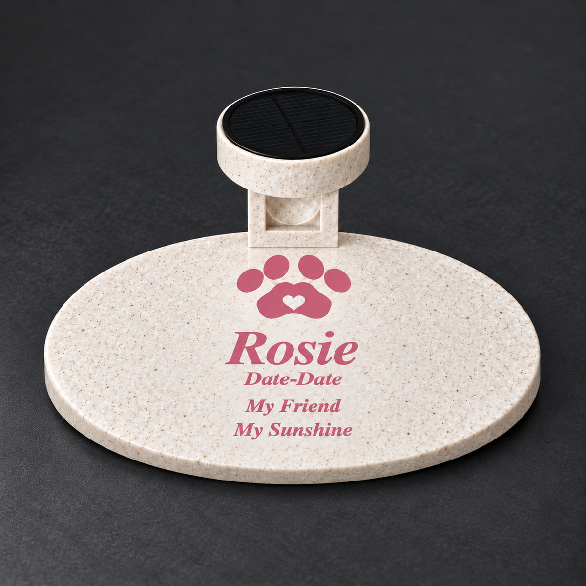 Smooth oval marble-look pet memorial with pink Rosie inscription and pink paw with marble-white heart, and matching solar light