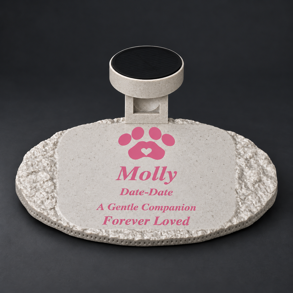 Rough oval marble-look pet memorial with Molly inscription and paw in pink, marble-white heart, and matching solar light