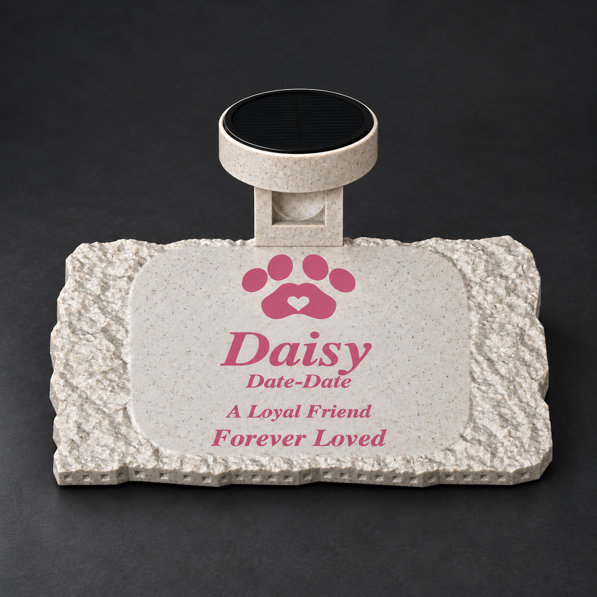 Rough rectangular marble-look pet memorial with pink Daisy inscription and pink paw with marble-white heart, and matching solar light