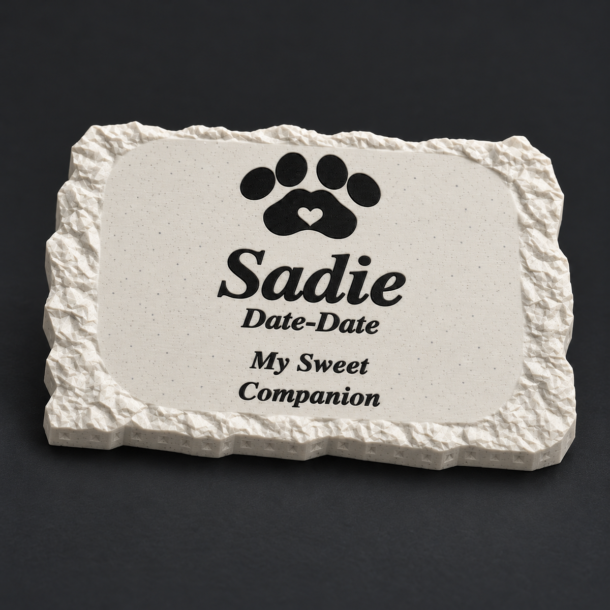 Personalized Pet Memorial – Small Rough Rectangle – Sadie with black lettering and paw; close-up of fine 3D print layers of matte speckled 3D-printed ASA, without LED.